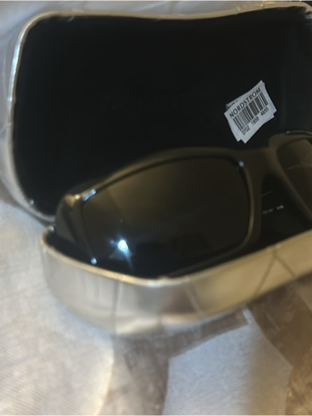 Chanel womenโs Sunglasses with Silver Case Accent